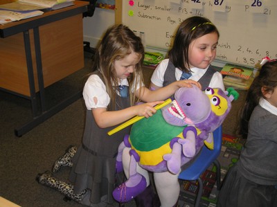 Learning how to brush our teeth properly.